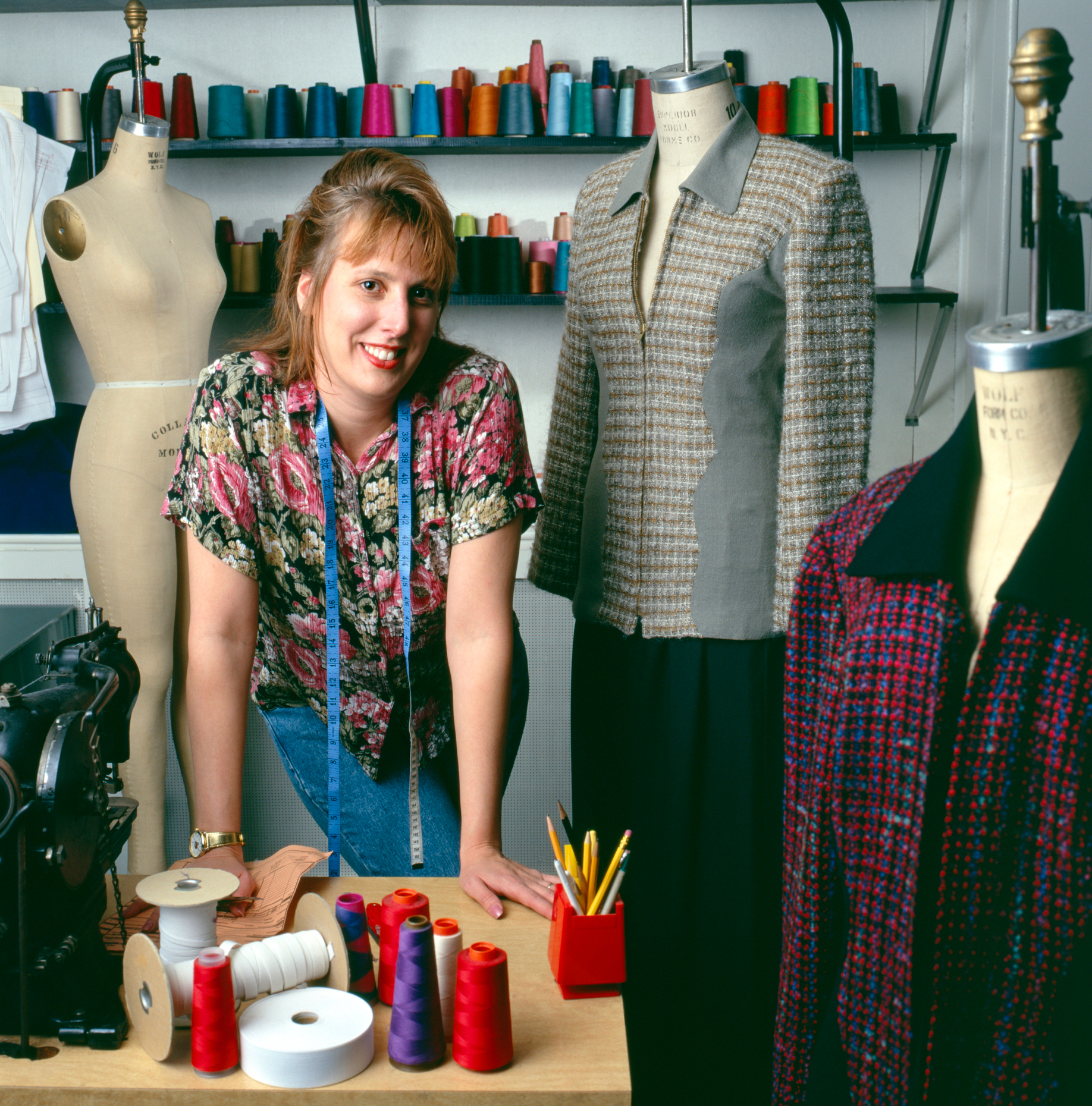 Environmental portrait of female entrepreneur in her design shop