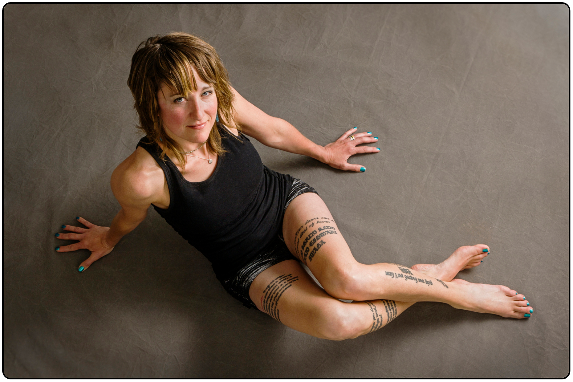 Studio portrait of tattoos on an attractive woman