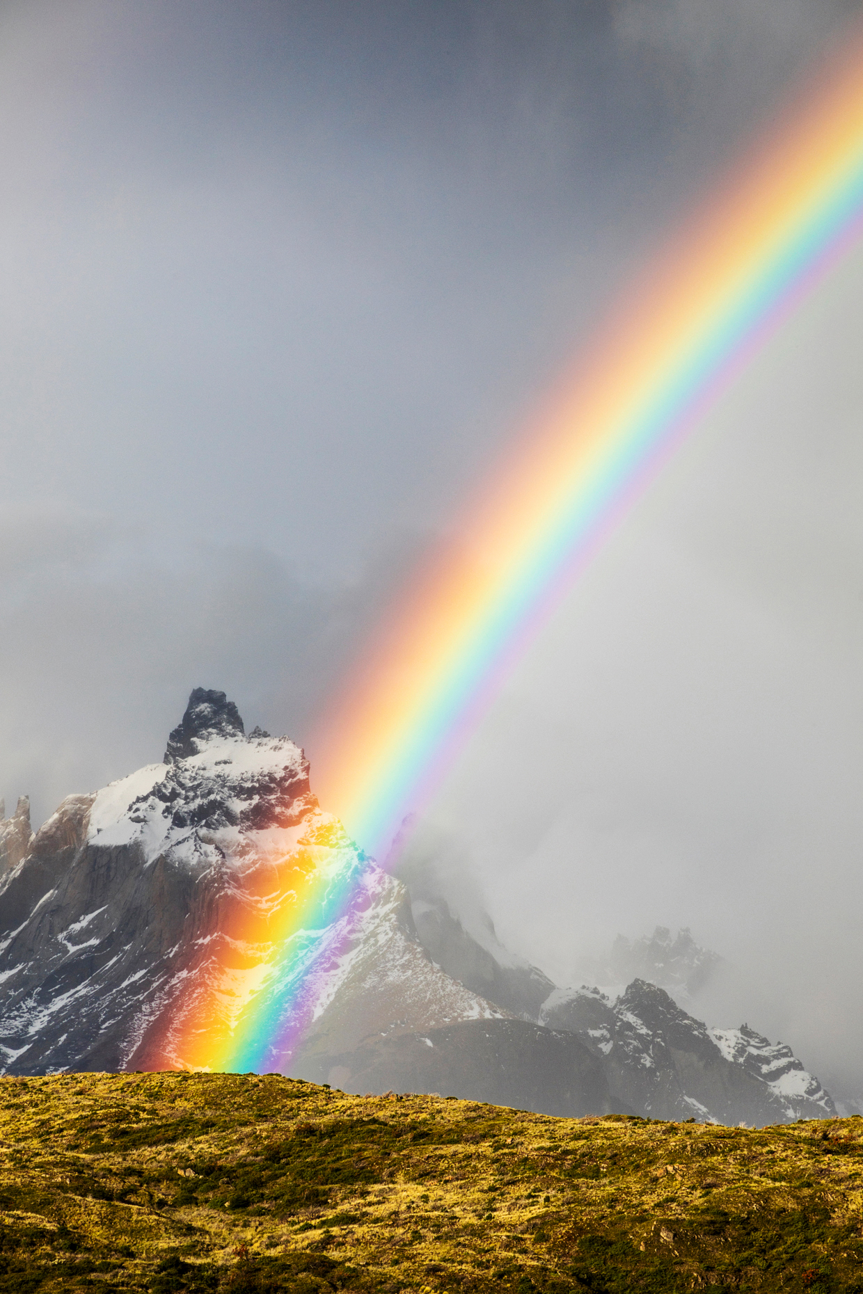 Spectacular rainbow over Cuernos del Paine; 2,000m; near Refugio Grey; Torres del Paine National Park; Chile
