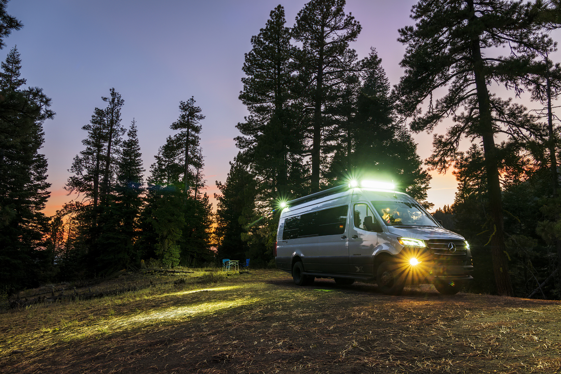 Night view of Airstream Interstate 24X campervan; disbursed camping; boondocking; Camus Sno-Park; National Forest; near Adel; Oregon; USA