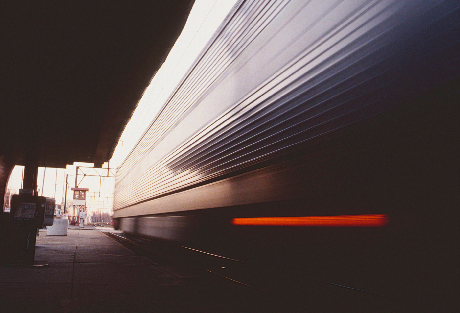 Pan blur motion view of SEPTA commuter train car leaving station