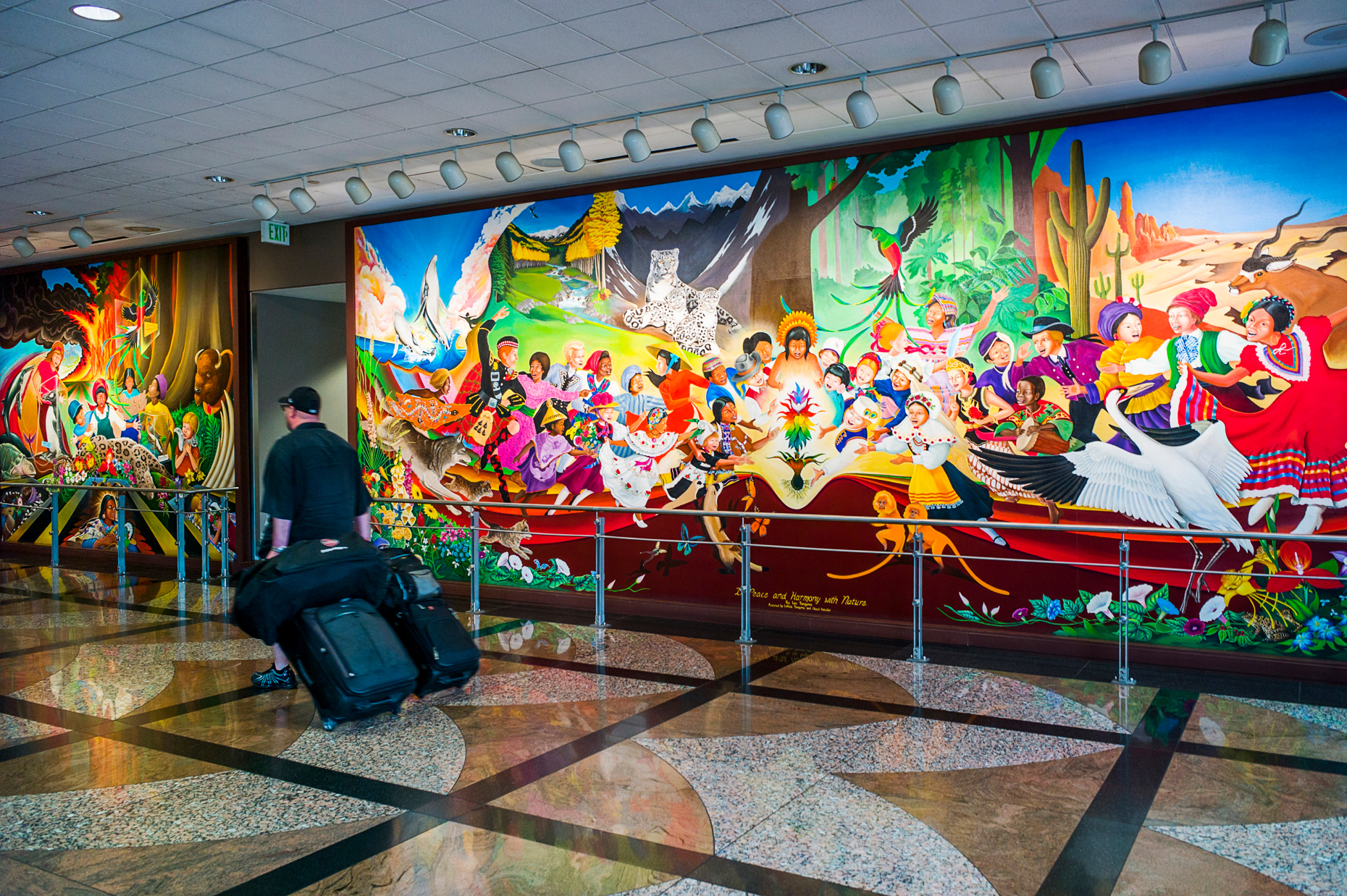Colorful mural titled "In Peace & Harmony with Nature", by Leo Tanguma, Denver International Airport, Colorado, USA