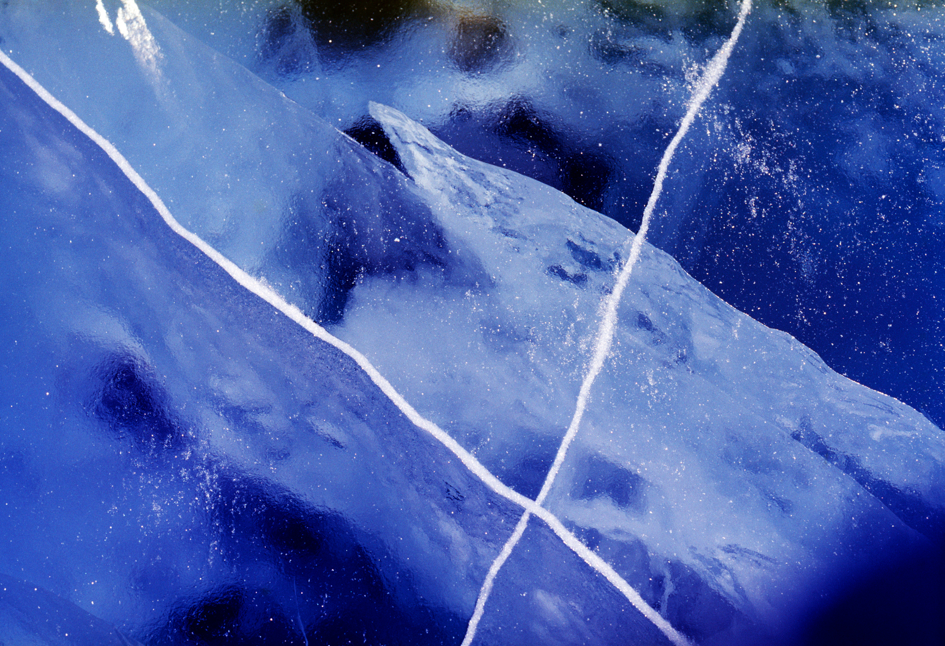 Abstract patterns in the clear blue ice of the Soper River, Baff