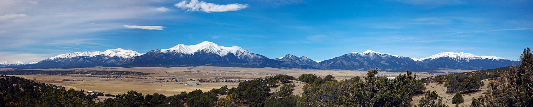 Panoramic view to the west of the Collegiate Peaks from near Rt. 285 and Buena Vista, Colorado, USA