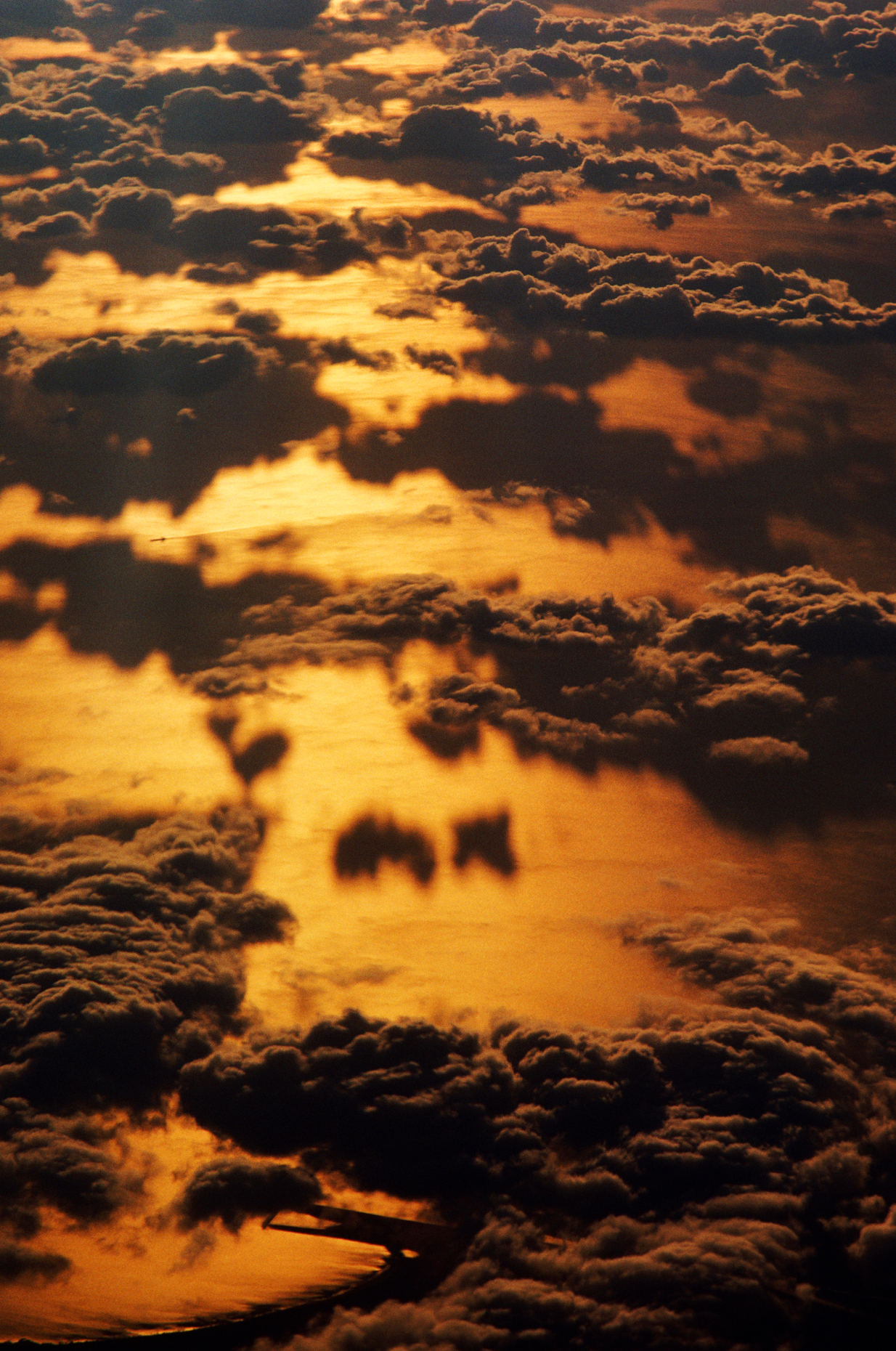 Aerial view of clouds and Lake Ontario at sunset, between New York state and Toronto, Canada