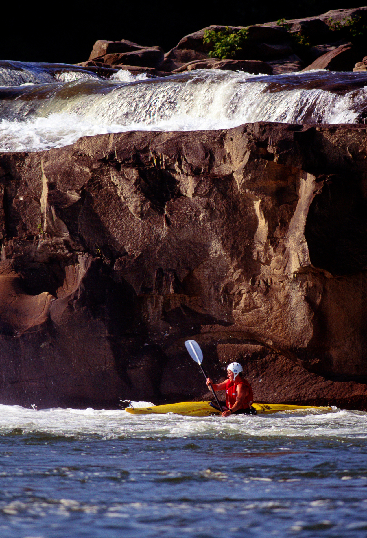 YOUNG MAN KAYAKING IN YOUGHIOGHENY RIVER, OHIOPYLE STATE PARK, P