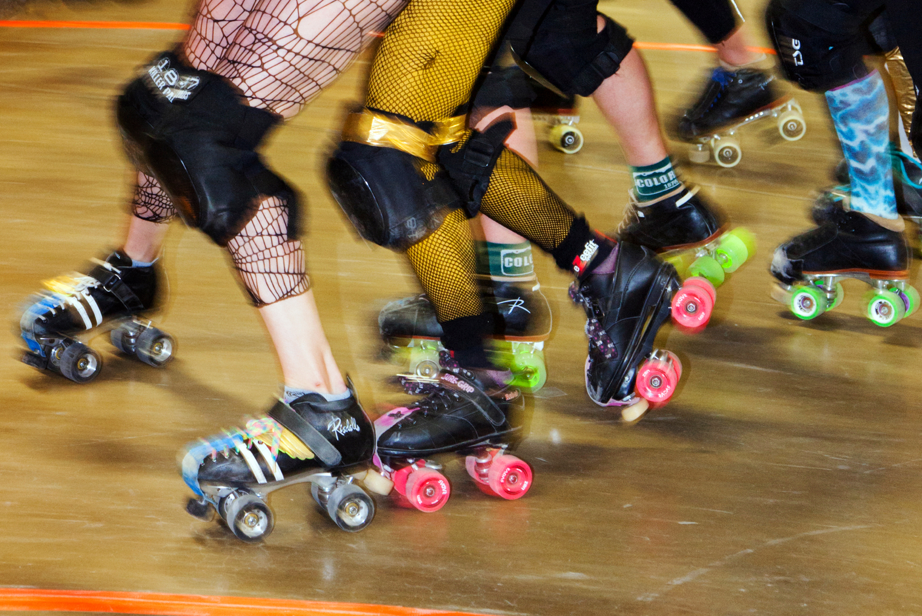 Women compete in the Ark Valley High Rollers Roller Derby, Chaffee County Fairgrounds, Colorado, USA