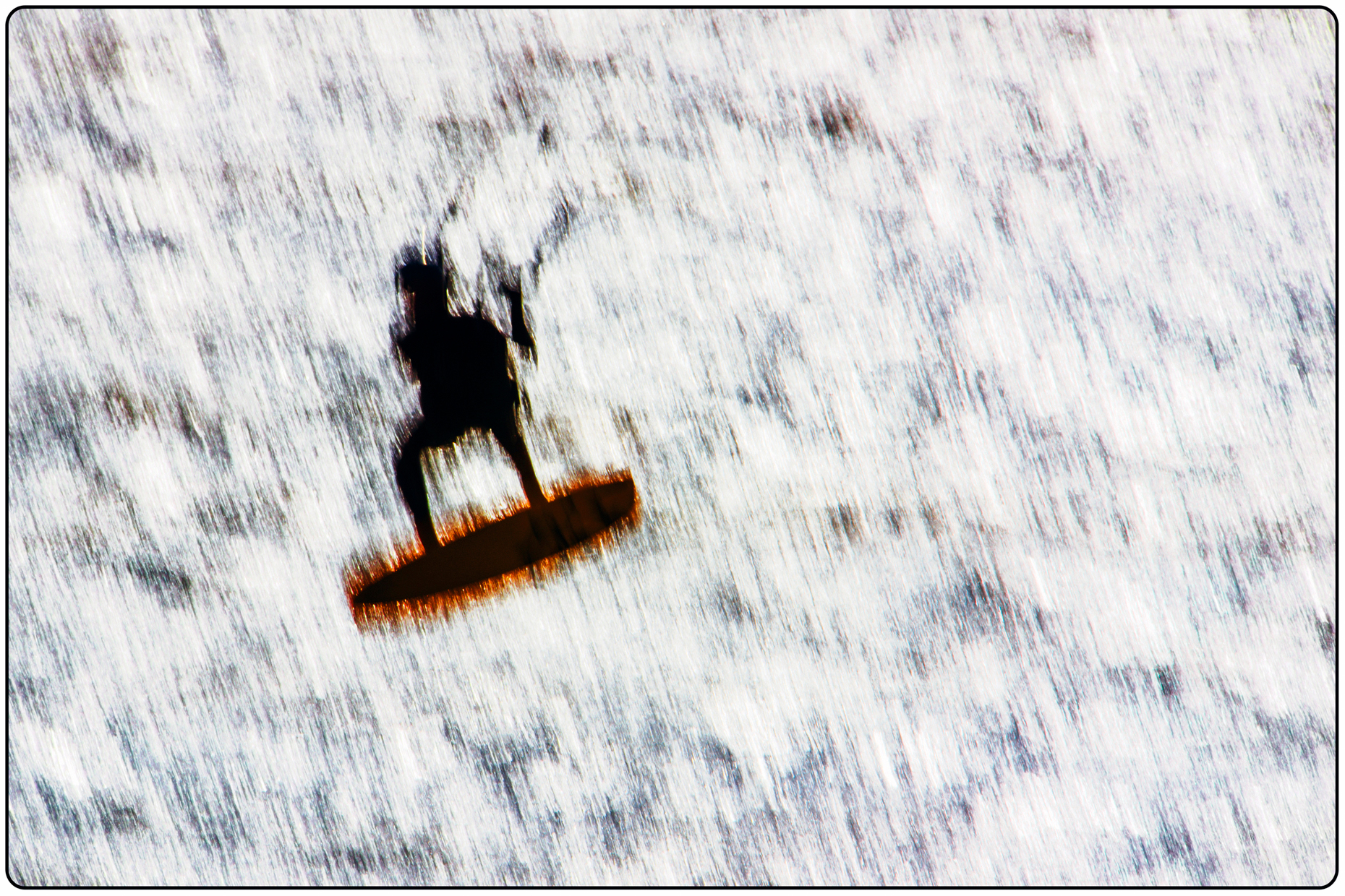 Action pan of kitesurfing on Turnagain Arm, Kenai Peninsula, Alaska, USA