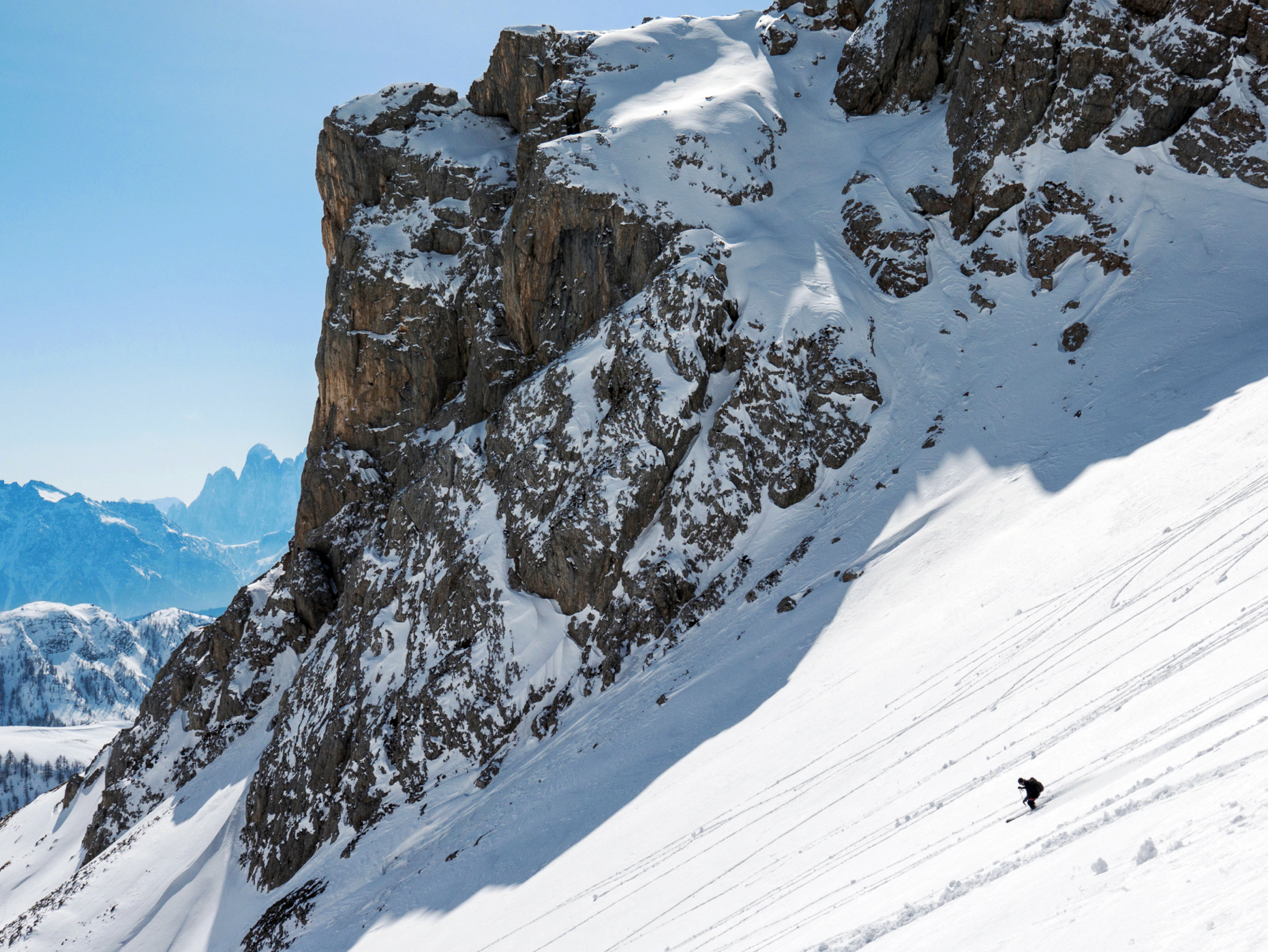 Backcountry skiers near the Rifugio Fuciade, Pale di San Martino, Dolomite Mountains, Alps, Italy