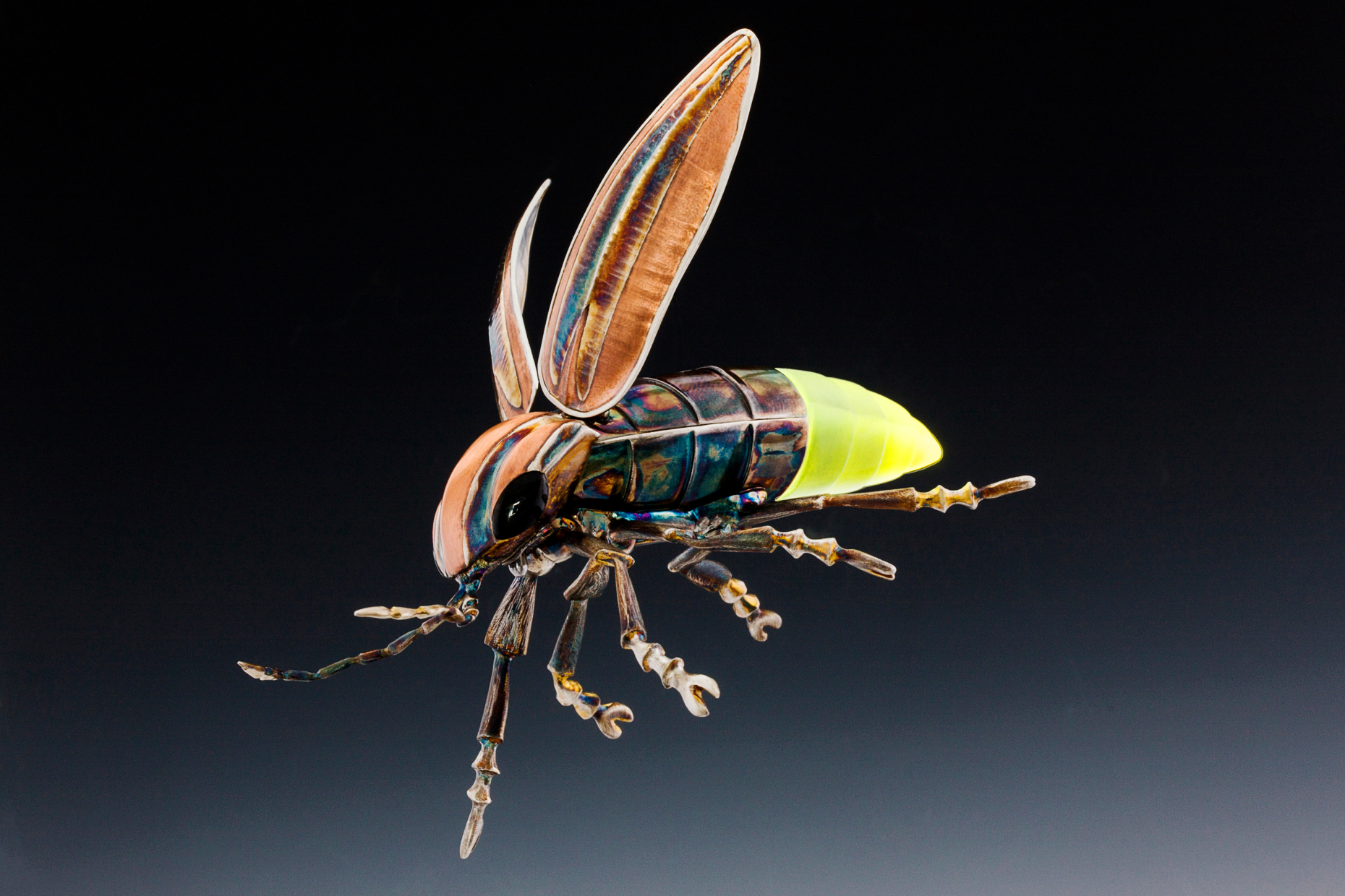Custom lightning bug sculpture by craftsman, artisan and metalsmith, Todd Tychewicz